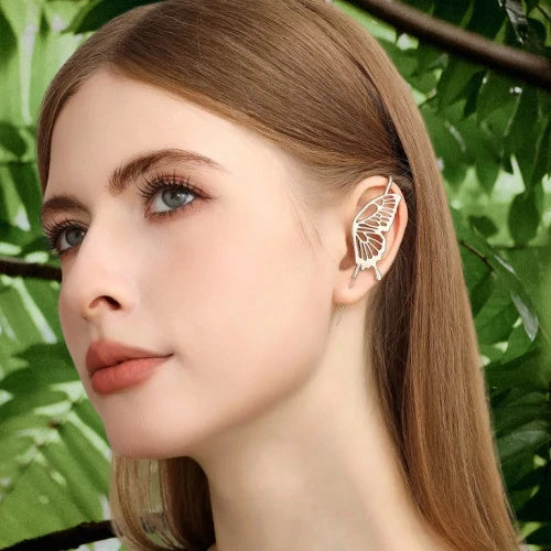 Boucle d'oreille O. papillon