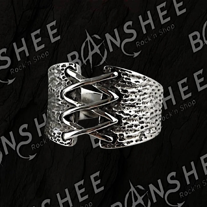 Bague large en acier inoxydable avec laçage central façon corset