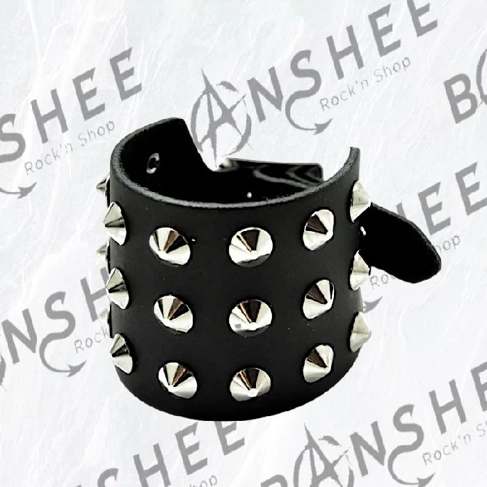 Bracelet fin noir en cuir avec petits spikes métalliques et fermeture à boucle