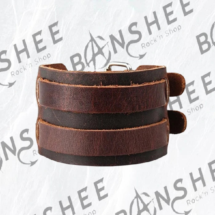Bracelet manchette en cuir marron composé de plusieurs bandes de cuir