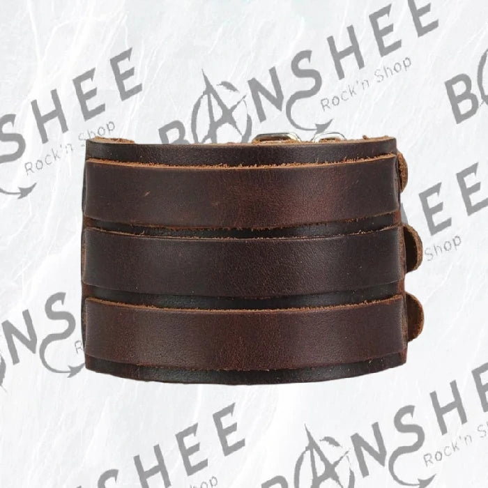 Bracelet manchette Moon Attic en cuir marron composé de plusieurs bandes de cuir