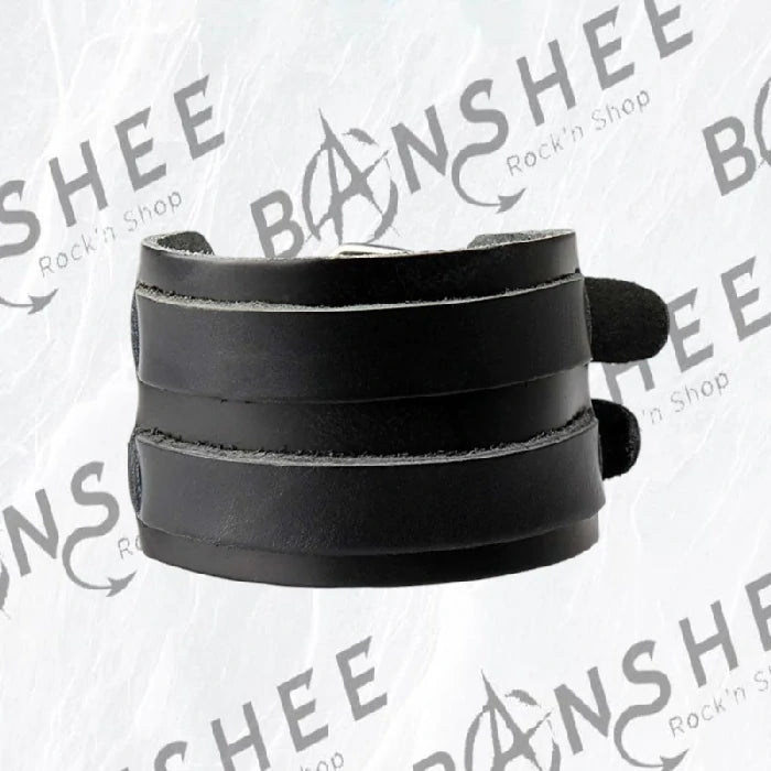 Bracelet manchette en cuir noir composé de plusieurs bandes de cuir