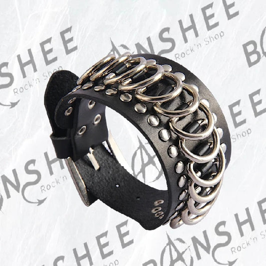 Bracelet manchette noir en cuir PU avec anneaux et rivets métalliques