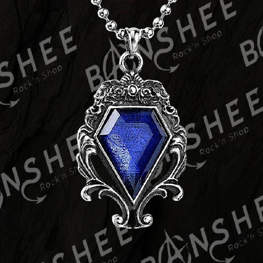 Collier en titane avec pendentif orné d'un zirconium bleu facetté dans un cadre de style gothique